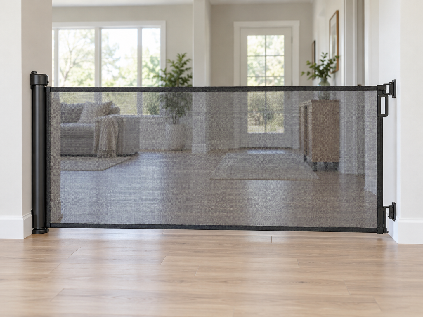 Extra-wide retractable mesh pet gate extended between two indoor walls